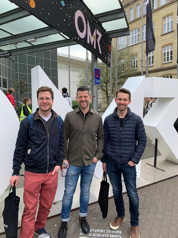 Die Händler Franziskus Weinert, Christian Krömer und Florian Bachmann auf der OMR